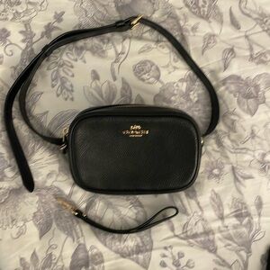 COACH BELT BAG. Black pebbles leather. Size: 7"Lx4.5"H.  Used like new.